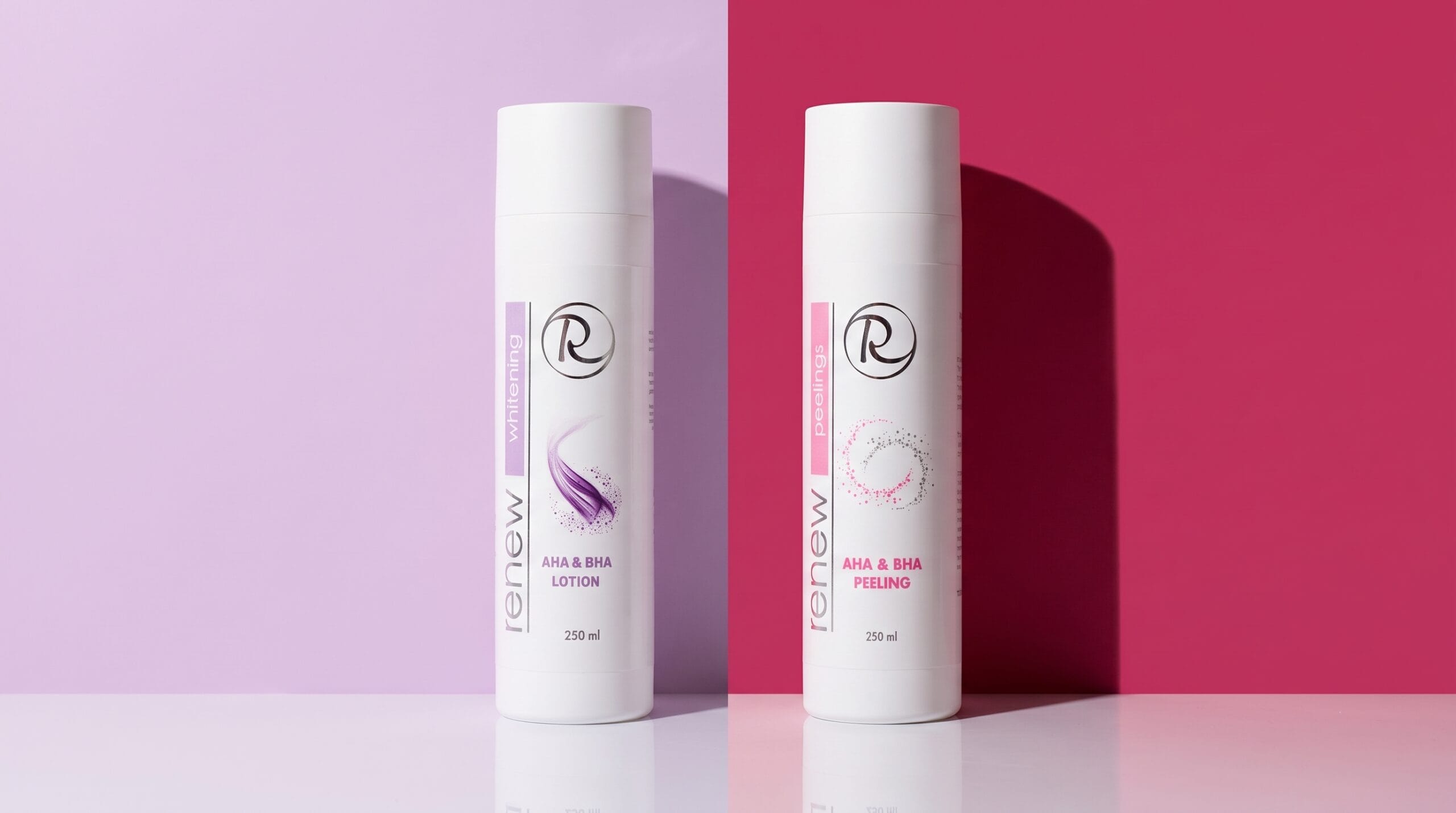 Tonik AHA & BHA Lotion i żel-peeling AHA & BHA Renew, oba z 2% kwasu salicylowego, na tle podzielonym na liliowy i malinowy